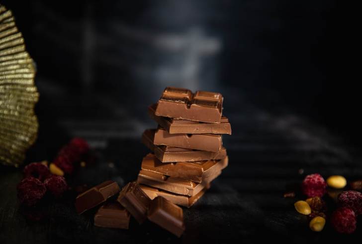 Dark chocolate contains tryptophan, theobromine, and phenylethylalanine