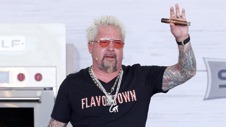 Did Guy Fieri throw Whoopi Goldberg out of his restaurant?